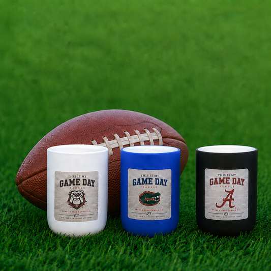 Game Day coconut soy candles in college team colors by Pearl & Reed