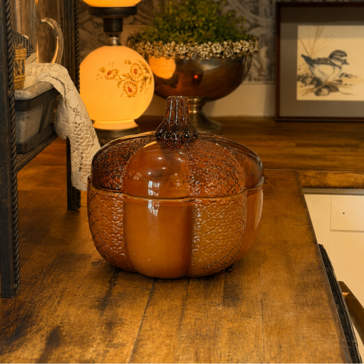 Amber glass pumpkin candle with fall fragrance by Pearl & Reed